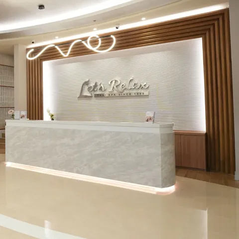 Warm cove and signage lighting at Let's Relax Dusit Central Park