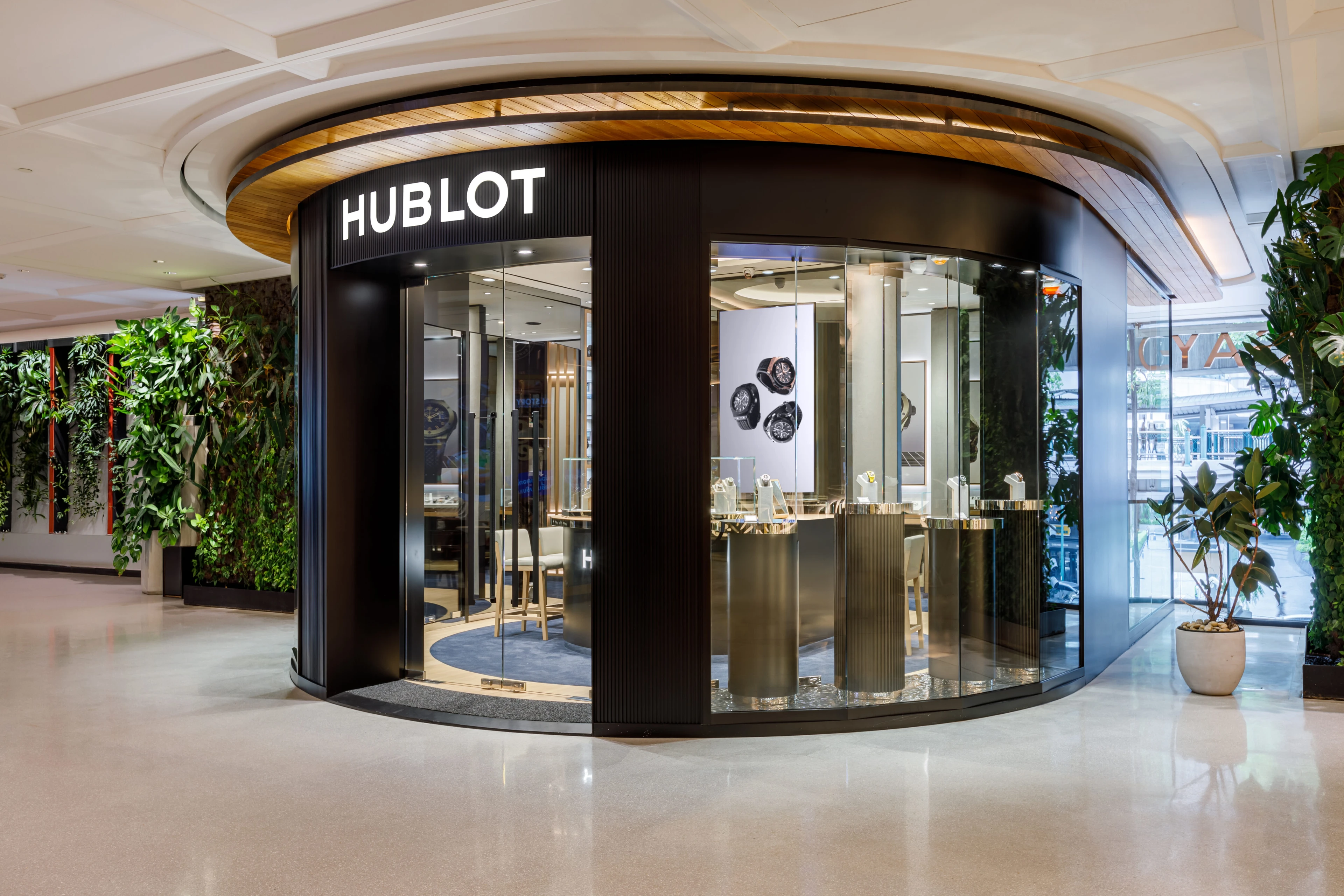 Curved illuminated Hublot storefront at Gaysorn Amarin
